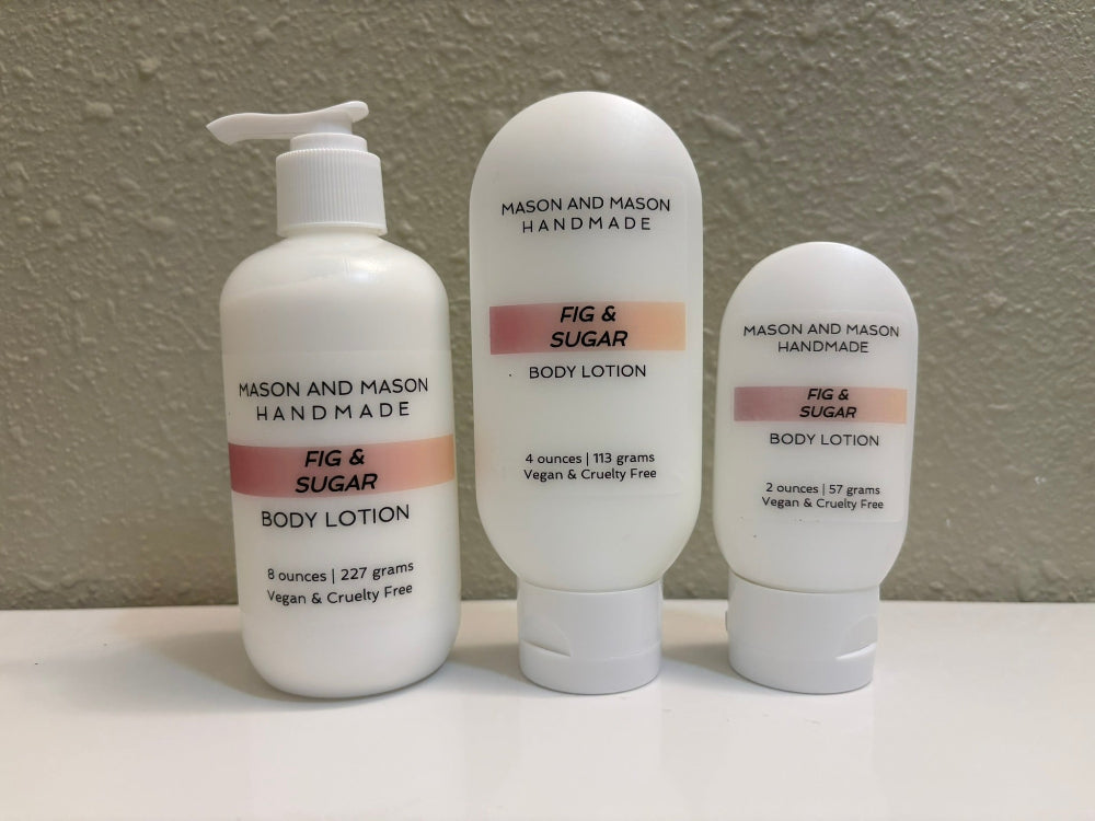 Three bottles of Mason and Mason Handmade Fig & Sugar body lotion on a neutral background